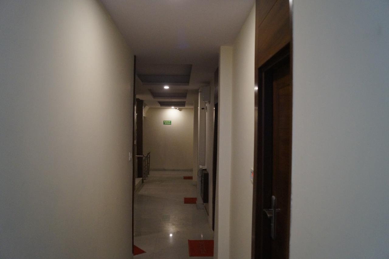 Hotel Optimum Oxford International Nuova Delhi Esterno foto